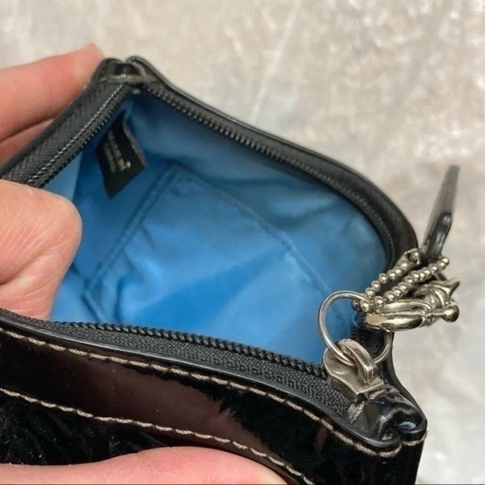 Coach embossed patent leather wristlet bag